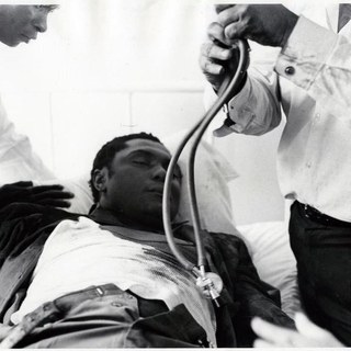 Doctors trying to resuscitate, save the life of Tom Mboya who had just been shot