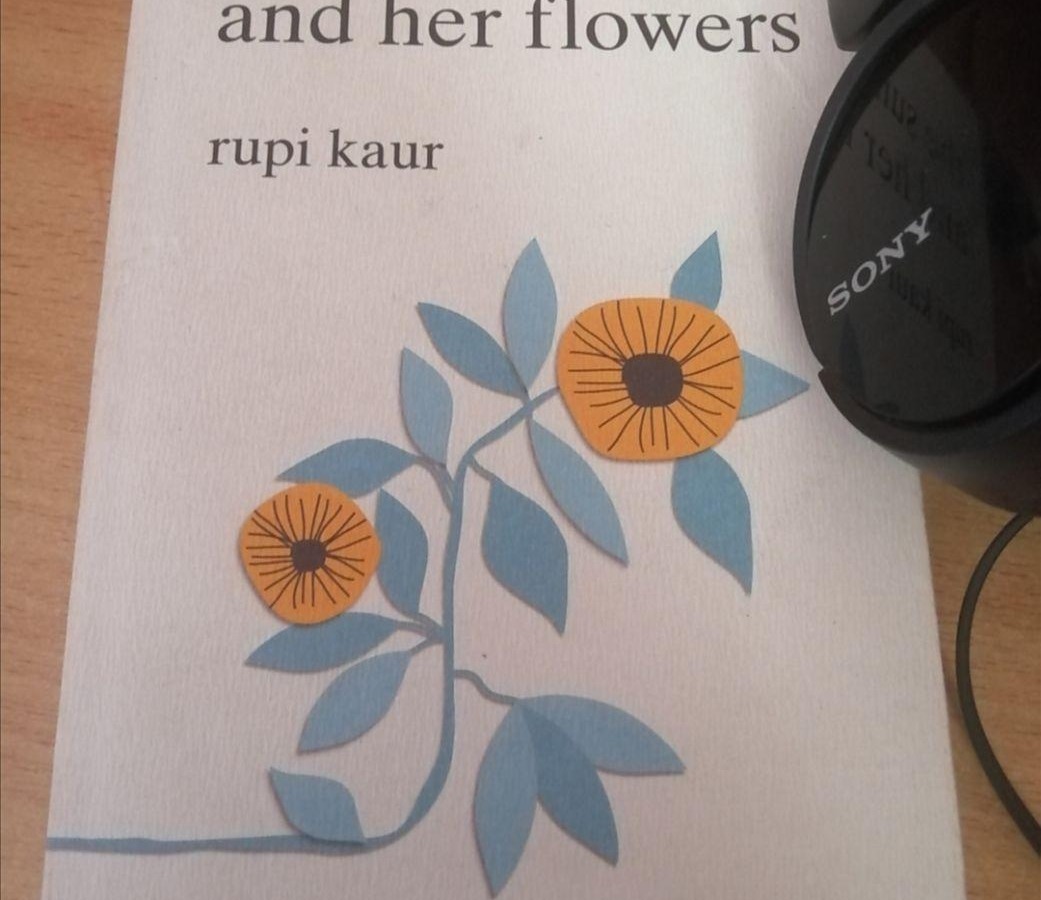 Rupi Kaur Sun and her flowers